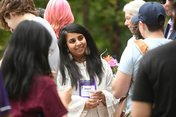 Photo of four Chatham University women smiling at an event