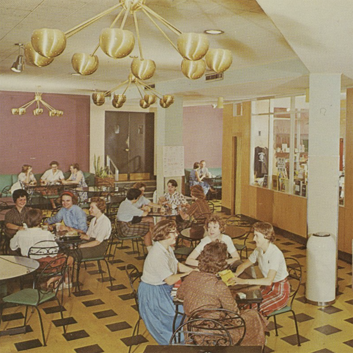 Vintage photograph of a dining hall on campus in the 1950s